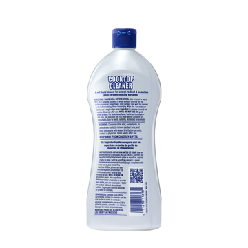 Bottle of Cooktop Cleaner showing usage instructions and warnings on the back label.