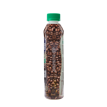 Bottle with a green cap featuring a coffee bean design and text about fair trade and organic certification.