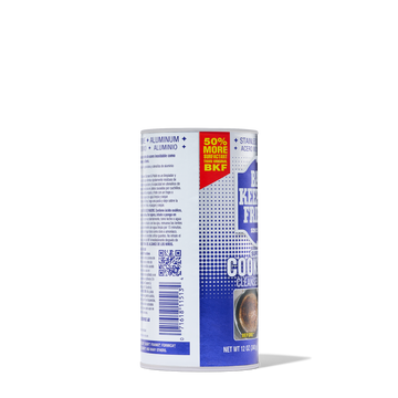 Container of cookware cleaner and polish with label showing usage for aluminum and stainless steel cookware.