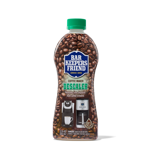 Bottle of Bar Keepers Friend Coffee Maker Descaler with coffee beans background and images of coffee makers on label.